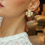 Pearl cross earrings