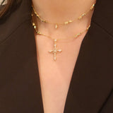 Layered cross necklace cream